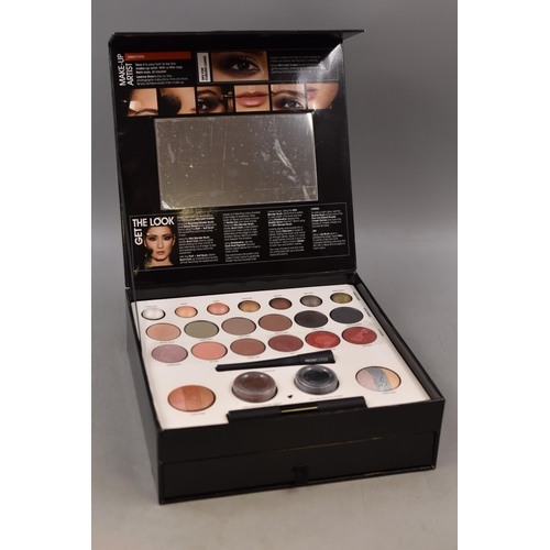 114 - A Front Cover Cosmetics Make-Up Set. Includes Eye Shadow, Lip Gloss, Mascara, Shadowline, And More