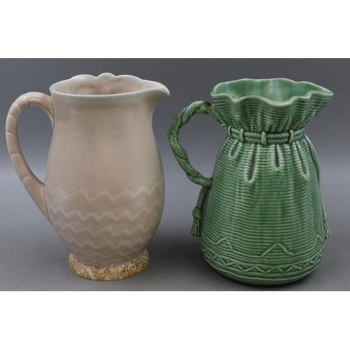 120 - Two Ceramic Jugs. Includes Beswick Palm Tree Jug, And Sylvac Bag Jug (AF)