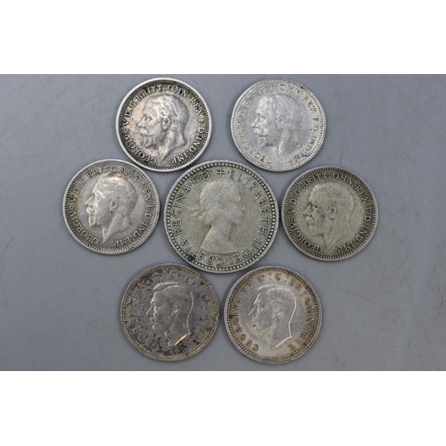 180 - Six Silver Threepence Coins and One Australian Silver Sixpence.