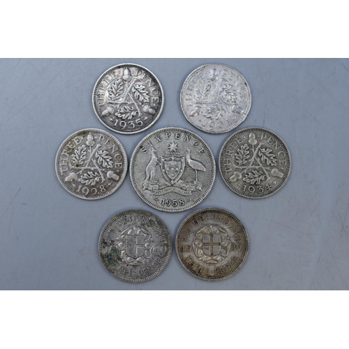 180 - Six Silver Threepence Coins and One Australian Silver Sixpence.