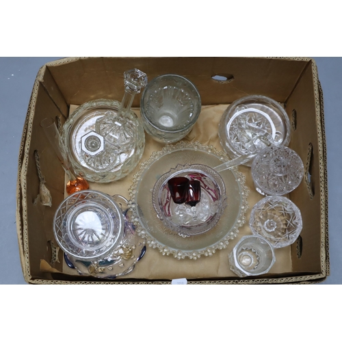 805 - Large selection of glassware to include candle sticks, bowls, glasses, vases and more