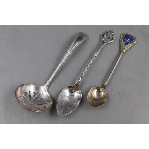 29 - A Selection of Three Sterling Silver Spoons. Includes Niagra Falls Teaspoon, Varanasi Teaspoon, And ... 