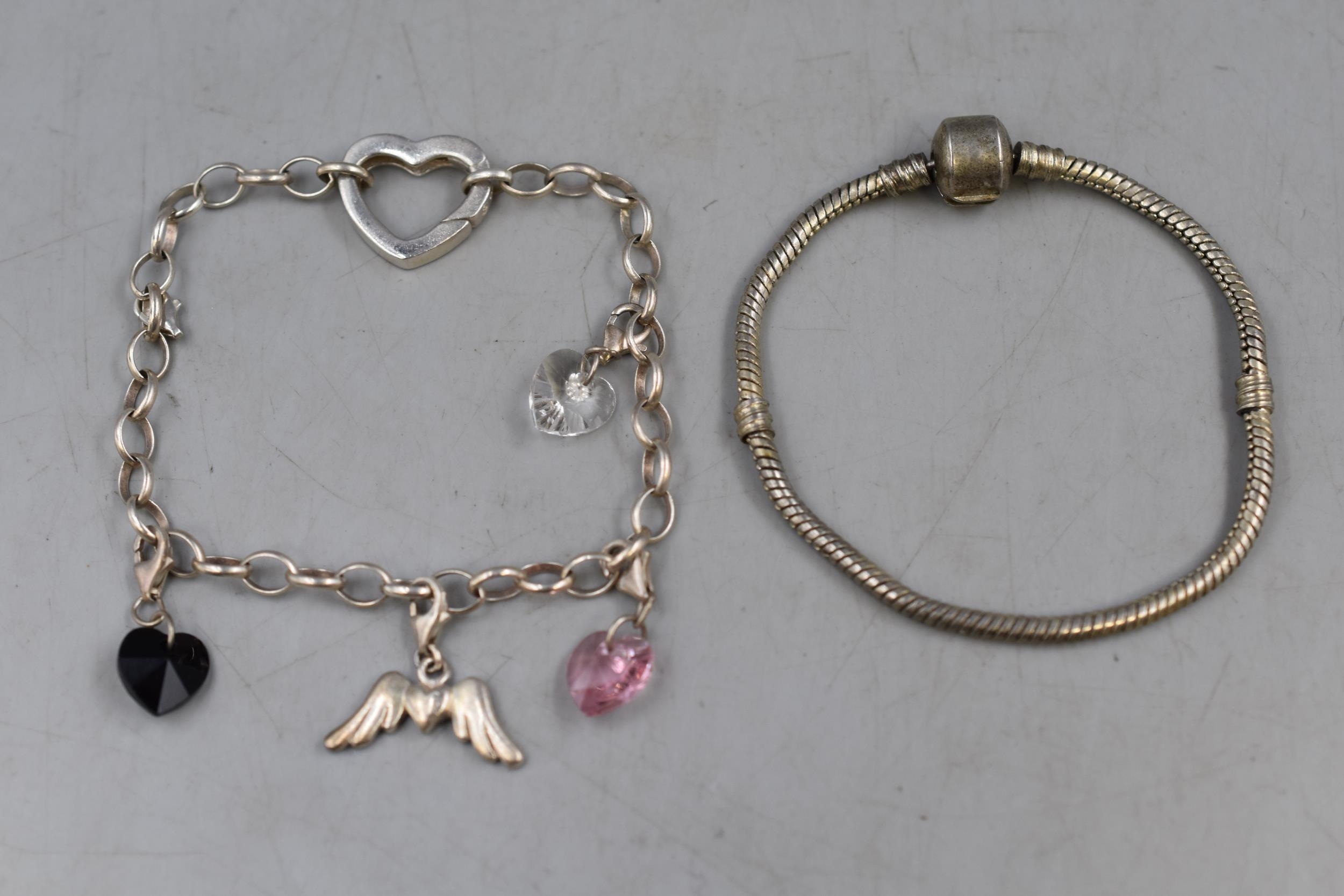 Sold at Auction: Sterling Silver Charm Bracelet