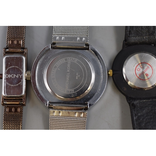 94 - Three Quartz Watches including Michael Kors, Kodak and DKNY Watches (All Working)