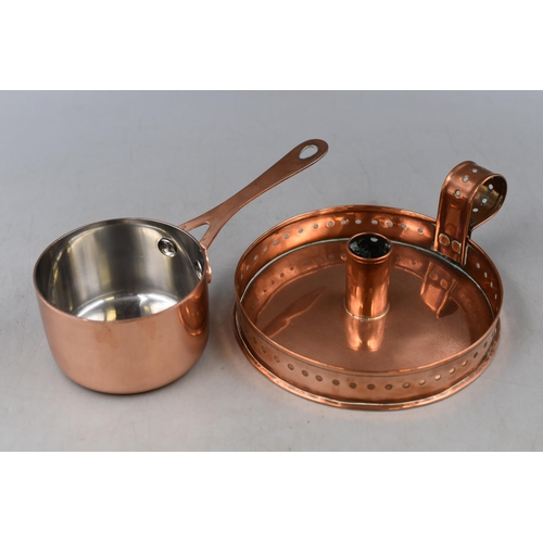 356 - Two Pieces of Copperware. Includes Brass Chamberstick and Brass Saucepan. Saucepan is Approx 8