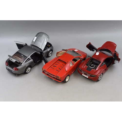 184 - Three Unboxed Die-Cast Models, ( A/F ) Scale 1:18, Two Autoart McLaren MP4-12C In Red and Ford Musta... 