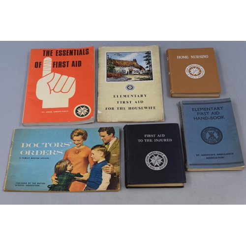 255 - A Selection of Retro First Aid Items. Includes Home Nursing Book, St Johns Ambulance Instructional S... 