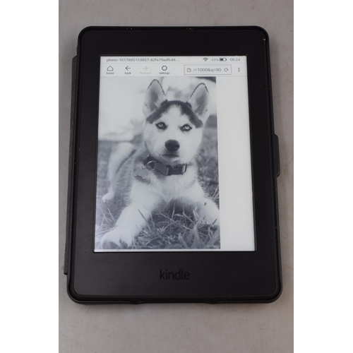 426 - Kindle paper white in case and in excellent condition, charged, working and factory reset.