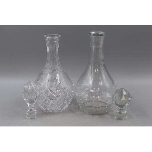 296 - Two Crystal Decanters Both Complete with Stoppers