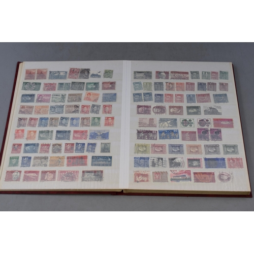 508 - A Stock Book Containing a large selection of  Worldwide Stamps including Austria, Argentina, Brazil,... 