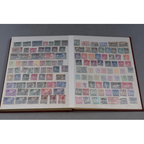 508 - A Stock Book Containing a large selection of  Worldwide Stamps including Austria, Argentina, Brazil,... 