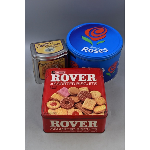 759 - Three Vintage Tins to include Large Cadbury Roses, Cadbury Chocolate Biscuits and Rover Assorted Bis... 