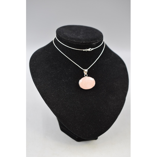 2 - A Sterling Silver Rose Quartz Pendant, On Sterling Silver Chain