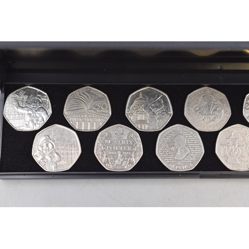 106 - Twelve Collectors 50p Coins and two £2 Coins including Paddington Bear, Sherlock Holmes and Mo... 