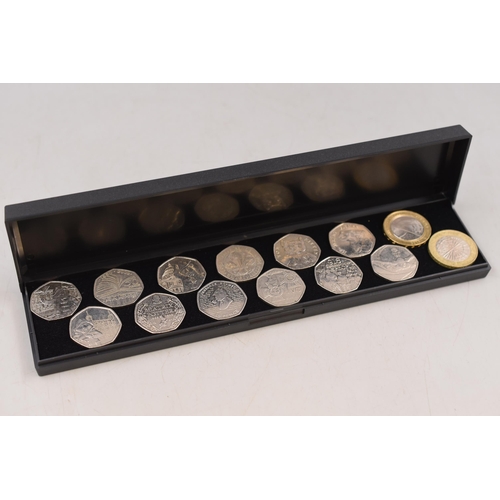 106 - Twelve Collectors 50p Coins and two £2 Coins including Paddington Bear, Sherlock Holmes and Mo... 