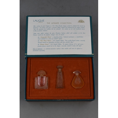 16 - Lalique 'The Ultimate Collection' A Set of Three Lalique Perfume Bottle Miniatures. Part Used