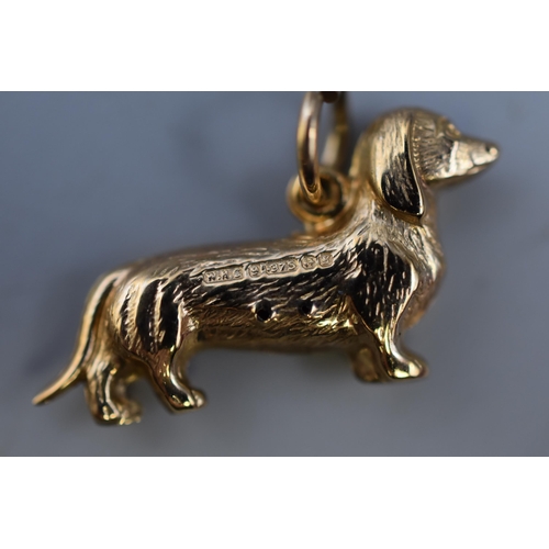5 - Hallmarked 375 (9ct) Gold Sausage Dog Pendant with makers mark (2cm). In Box