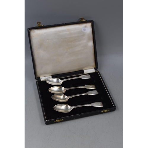 64 - Four Victorian Hallmarked Silver Tea Spoons with Case (Weight 94 grams)