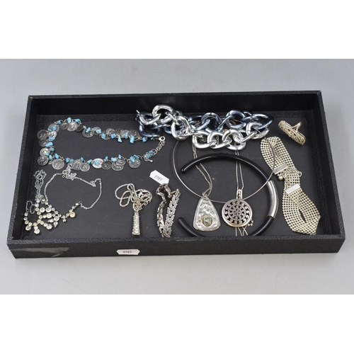 91 - A Selection of Designer Silver Tone Jewellery Pieces To Include Ring, Necklaces, And Bracelet