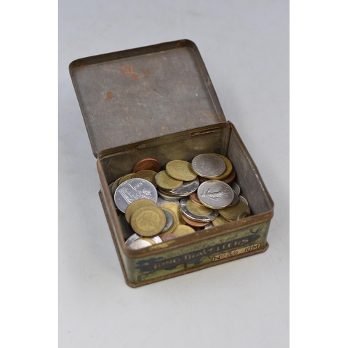 127 - A Vintage Tin Containing Unsorted Worldwide Coins