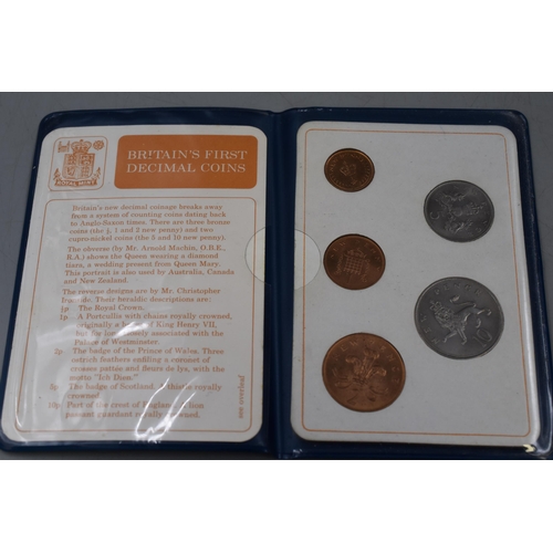 128 - Seven Britain's First Decimal Coin Set