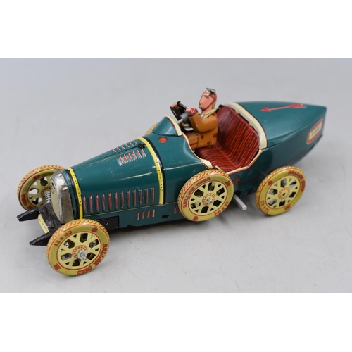 173 - A Vintage Tin Plate Car Toy, Bugatti 1-970. Working But No Key