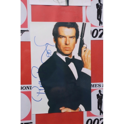 383 - Framed and Glazed Collection of James Bond Printed Photographs with printed signatures 20