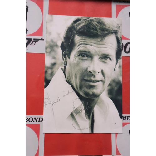 383 - Framed and Glazed Collection of James Bond Printed Photographs with printed signatures 20