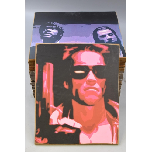 430 - A Selection of Twenty Pop Art Prints Depicting Musicians, Sportsmen, And Film Characters. All Approx... 