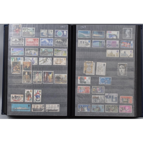 443 - A WH Smith Stamp Stock Book Containing GB Used and Mint Stamps From 1902-1970. Includes Sets, High V... 