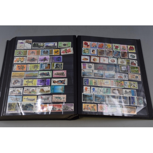 446 - Two Albums of Various Commonwealth Stamps