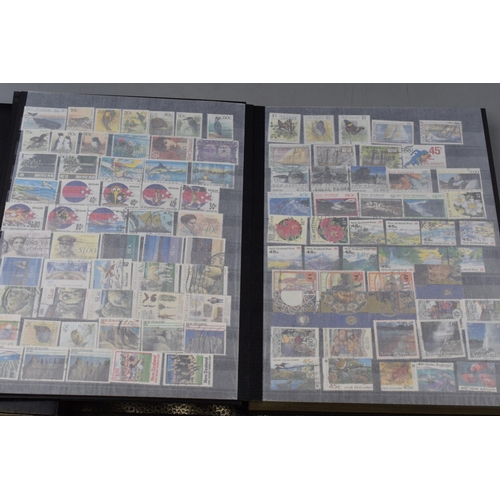 446 - Two Albums of Various Commonwealth Stamps