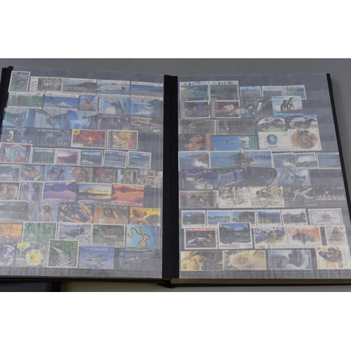 446 - Two Albums of Various Commonwealth Stamps