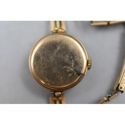 14 - A Vintage Ladies Hirco 15 Jewels Mechanical Watch, With 9ct Gold Case and 12ct Rolled Strap. Mechani... 