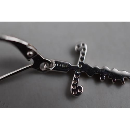 63 - Pair of Silver 925 Cross 'Faith' Drop Earrings together with Two Silver 925 Celtic Style Rings