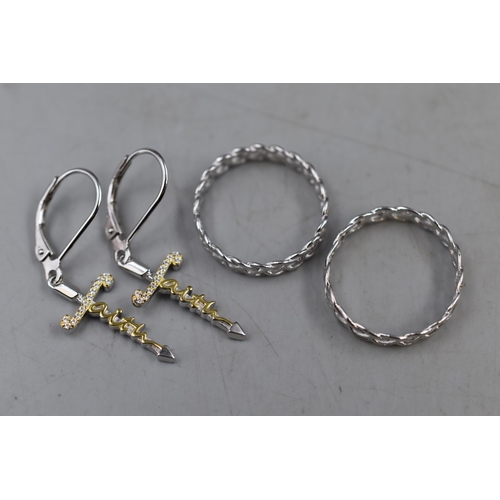 63 - Pair of Silver 925 Cross 'Faith' Drop Earrings together with Two Silver 925 Celtic Style Rings