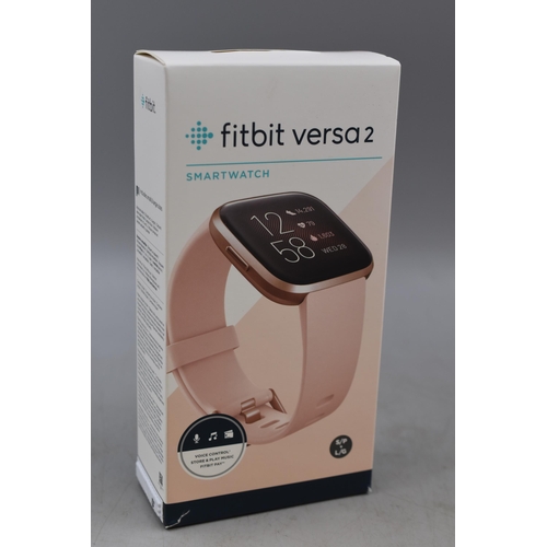 69 - A Boxed Fitbit Versa 2, Powers on When Tested