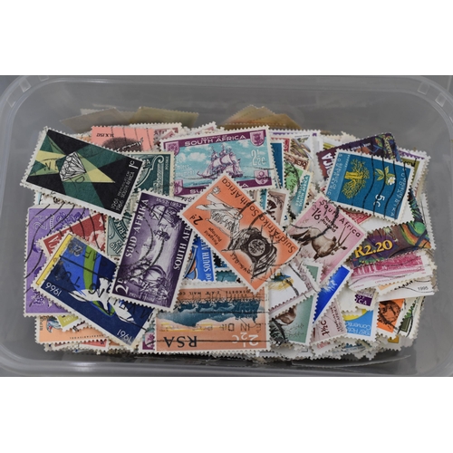 97 - Four Boxes of Mixed unsorted Worldwide Stamps