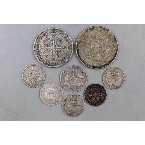 103 - A Selection of Various Silver Coins. Includes 1936 Florin, Five UK Threepence Coins, 1921 Australian... 