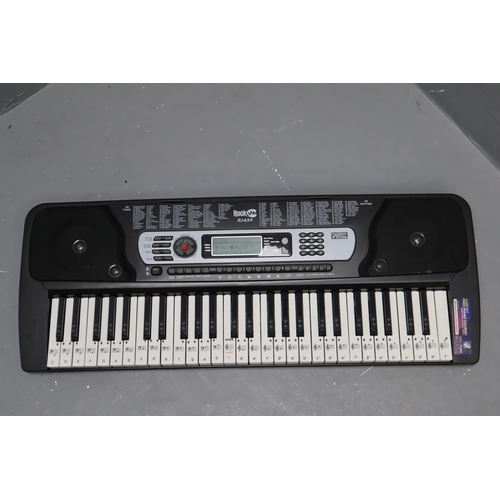 516 - A Rockjam RJ-654 Keyboard, Powers on When Tested. No Power Cable Included