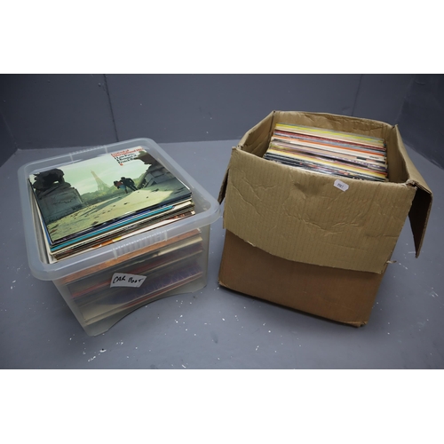 560 - Two Boxes of Assorted Vinyl LP's and Singles. To Include Elvis, Johnny Cash, Classical, Brass Band a... 