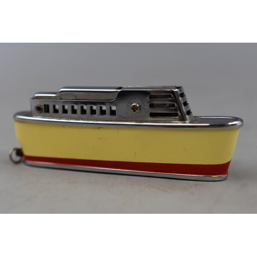 217 - A Novelty Sarome 'Cruiser' Lighter, With Silver Plated Cigarette Case