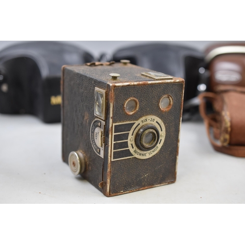 576 - Selection of Vintage Cameras Including Minolta X-300, fujica ST605 and More