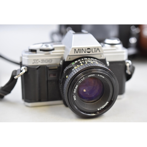 576 - Selection of Vintage Cameras Including Minolta X-300, fujica ST605 and More