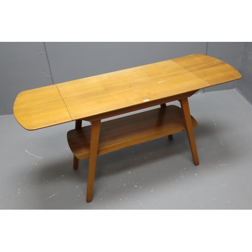 641 - Mid century light wood drop leaf table with shelf, measures 45