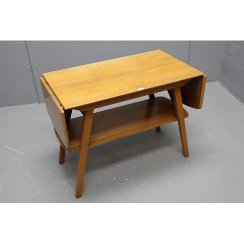 641 - Mid century light wood drop leaf table with shelf, measures 45