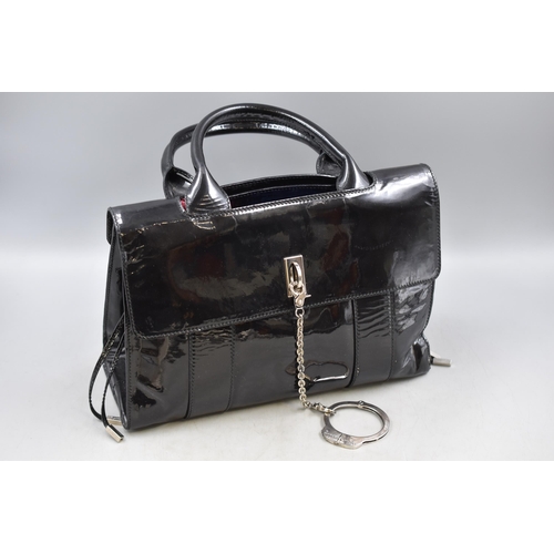 661 - A Designer Cesare Paciotti Handcuff Handbag