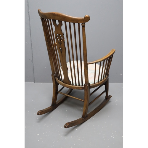 697 - 19th century wooden rocking chair, measures 36