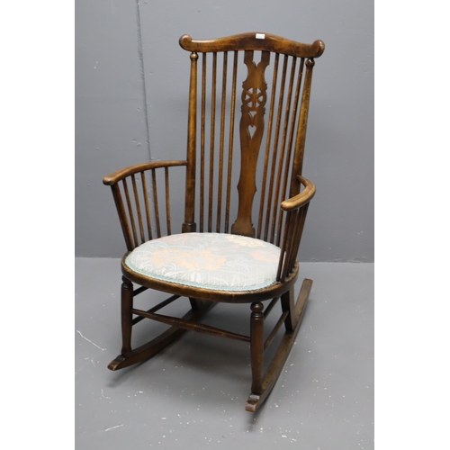 697 - 19th century wooden rocking chair, measures 36