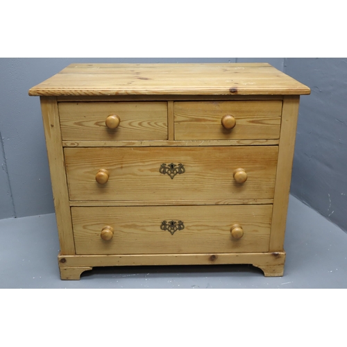 724 - Pine chest of drawers with 2 small and 2 large drawers measures 36